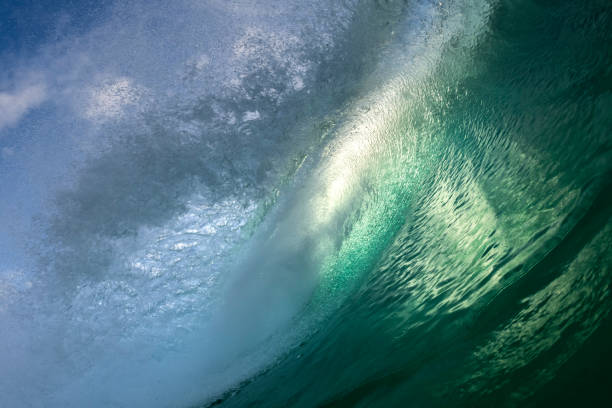 istock Splashing waves at sunrise 1238728907