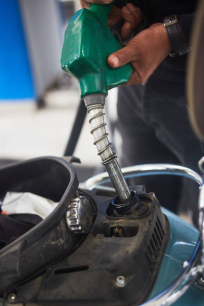 istock Close-up Refueling Motorcycle At Gas Station 1238769972