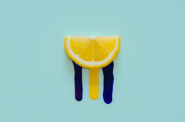 istock Slice lemon that have yellow and dark blue poster color. 1238886775