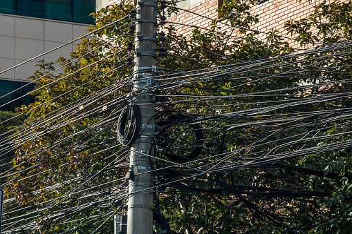 power lines on electric pole in Sao Paulo city