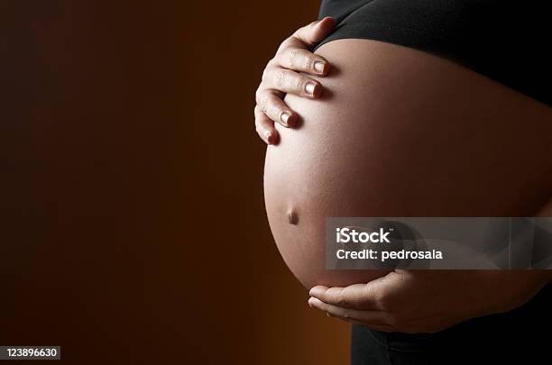 Pregnancy Stock Photo - Download Image Now - Affectionate, Close-up, Color Image