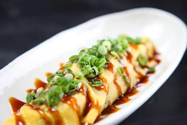 Japanese TONPEI omelet with sauce