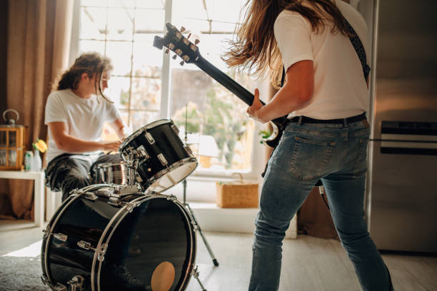 istock Teenager Playing Rock and Roll At Home 1239081390