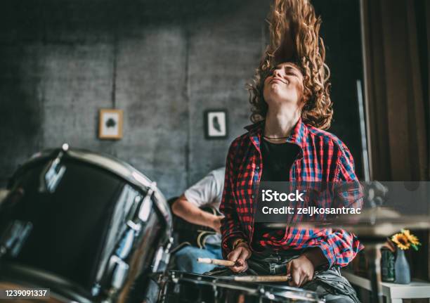 Teenager Playing Rock And Roll At Home Stock Photo - Download Image Now - Drum - Percussion Instrument, Drummer, Rock Music