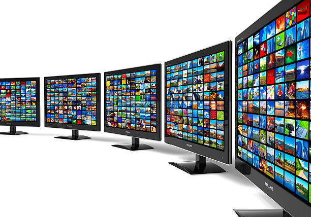 Row of widescreen HD displays wtih multiple images See also: cable tv stock pictures, royalty-free photos & images
