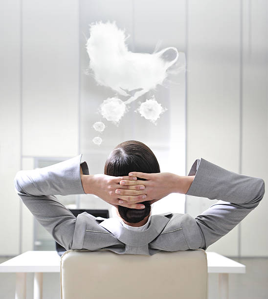 istock business woman from behind. Dreaming about child 123910270