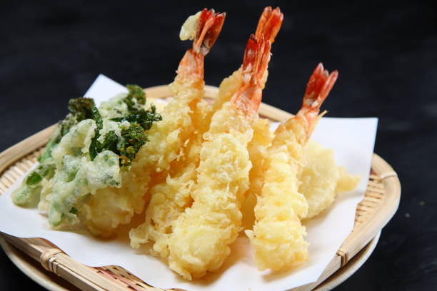 seasonal fresh tempra assorted basket seasonal fresh tempra assorted basket on dark background Tempura Prawns stock pictures, royalty-free photos & images