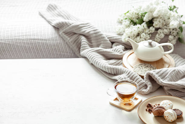 istock Cozy spring composition with tea and blooming lilac. 1239105731