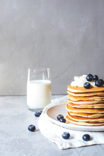 istock Stack of pancakes with fresh blueberry. 1239136572