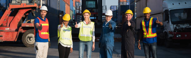 istock Group of foreman man & woman worker working checking at Container cargo harbor to loading containers. Dock male and female staff business Logistics import export shipping concept. 1239163116