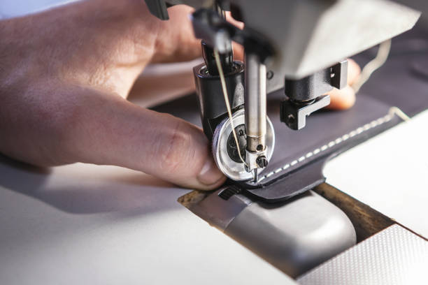 istock Close up of professional sewing machine for leather work. 1239203987