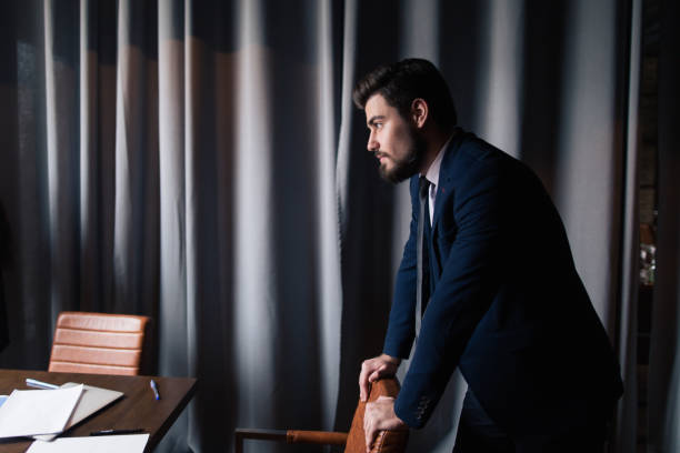 istock Handsome smiling confident businessman portrait 1239205395