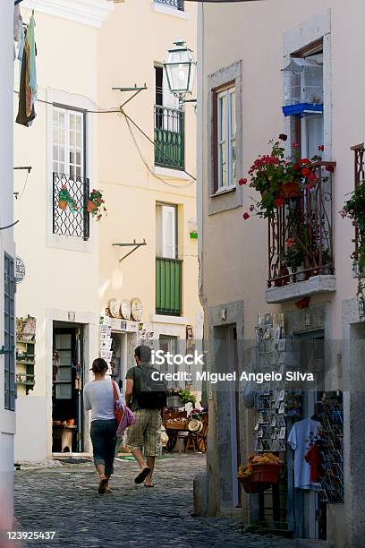 Lisbon Street And Couple Stock Photo - Download Image Now - Lisbon - Portugal, Store, Antique