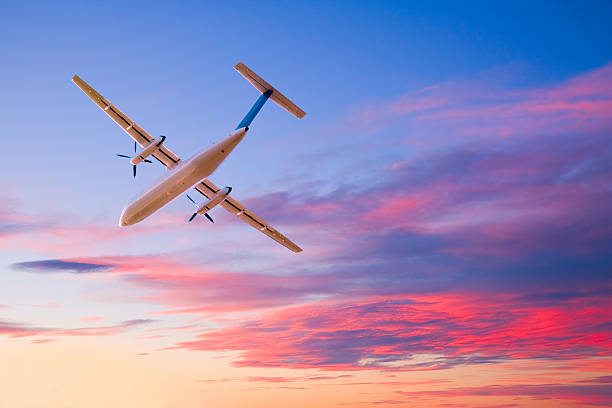 istock Bombadier Q300 Taking Off At Sunset 123925974