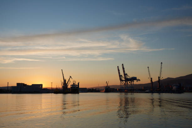 istock Sea port at sunset 1239261575