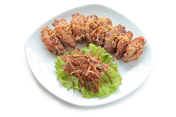 istock Fried chicken Fried lemongrass isolated on white background. With clipping path. 1239272054