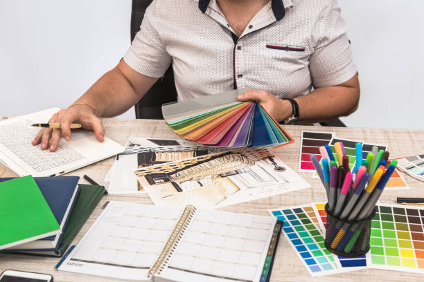 istock Engineer and architect concept - Designer creative working with  sketch plan blueprint and color sampler. 1239273149