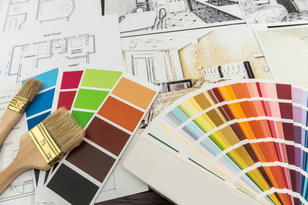 istock Design home renovation.  house plan composition and brushes with color palette on table. 1239303809