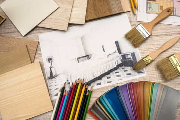 istock architect work - drawing sketch plans blueprints with color palette for help 1239308458