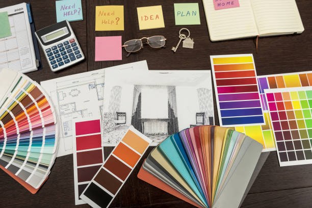 istock Design home renovation.  house plan composition and brushes with color palette on table. 1239314969