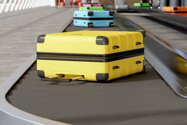 istock Luggages Moving On Airport Conveyor Belt 1239318345
