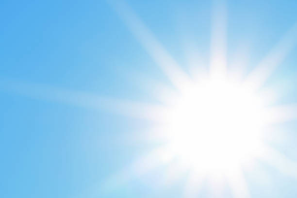 istock Bright sun with beautiful beams in the sky 1239337583