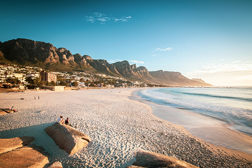 Camps Bay and Twelve Apostles at sunset. View across Camps Bay and the Twelve Apostles (Table Mountain) at sunset.