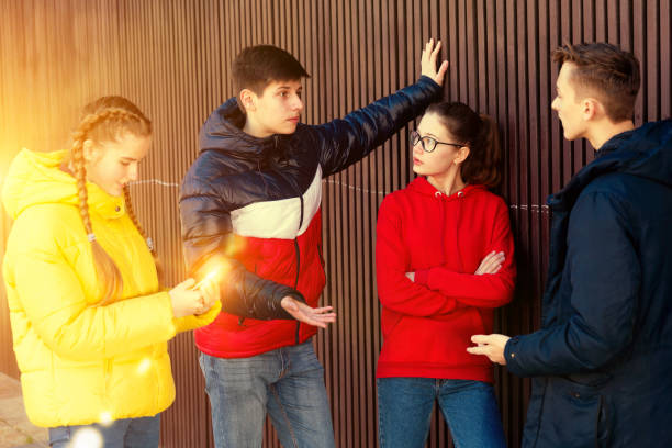 istock Teenagers gathering outdoors 1239349623