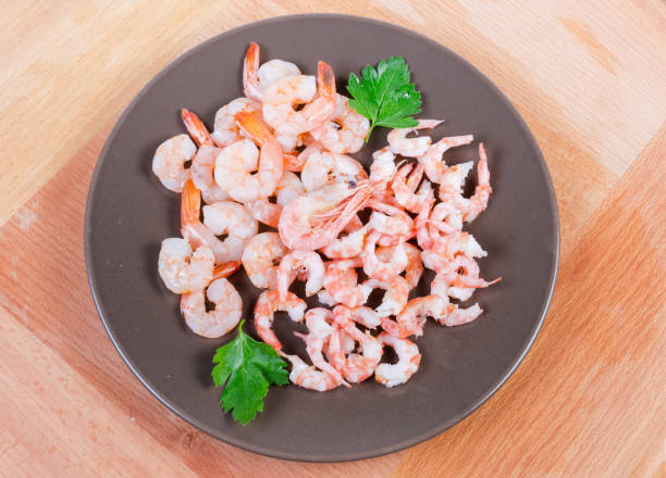 istock Cooked tails different shrimps on dish, top view 1239377076