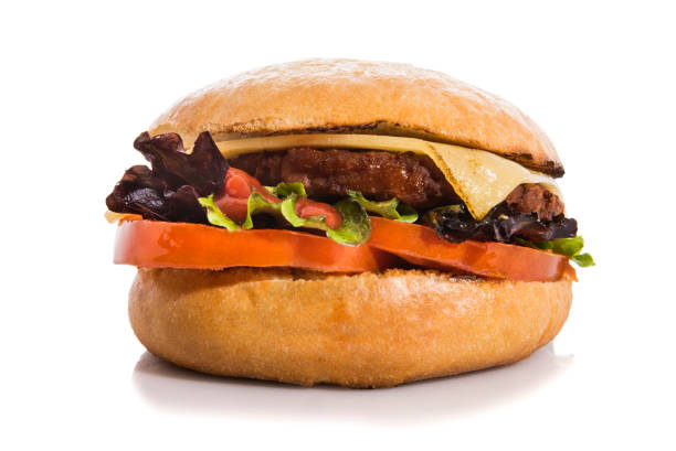 istock Beef burger with homemade bread isolated on white. 1239393693