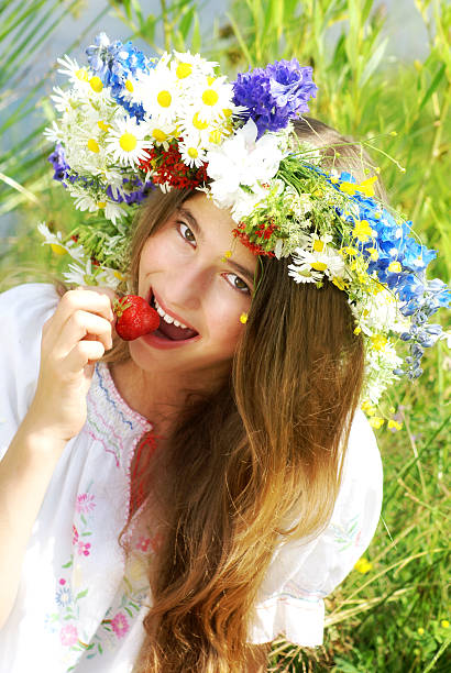 istock Beautiful girl eating strawberry 123939491