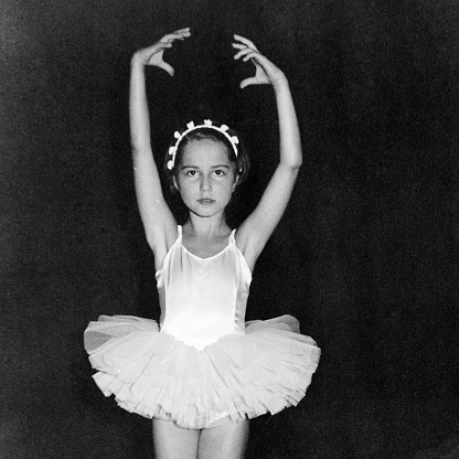 Little Girl Dancing on Stage in 1958. Black And White.
