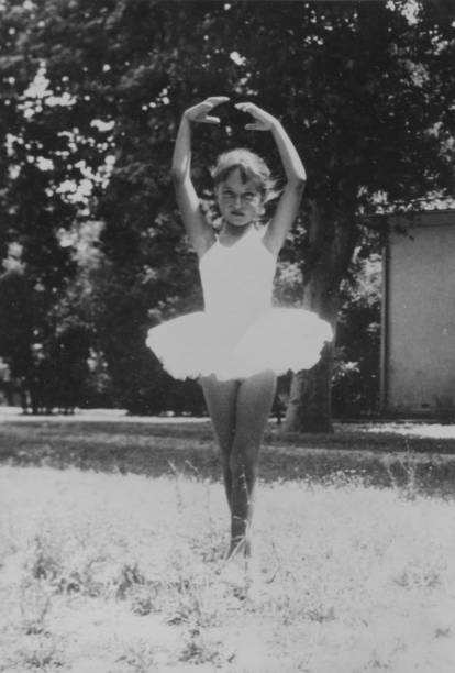 Little Girl Dancing in a Park, 1958. Little Girl Dancing in a Park, 1958. Black And White. ballet photos stock pictures, royalty-free photos & images