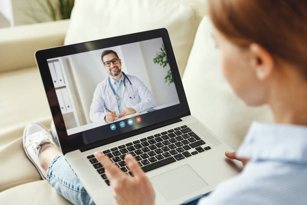 istock Woman using tablet to speak with doctor 1239406120