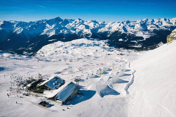 Aerial drone view of Madonna di Campiglio and ursus snowpark in Val Rendena dolomites trentino Italy Aerial drone view of Madonna di Campiglio and ursus snowpark in Val Rendena dolomites trentino Italy val stock pictures, royalty-free photos & images