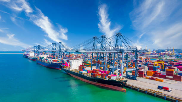 istock Global transport cargo and logistic business import and export, Container ship in seaport terminal, Container cargo vessel freight shipping company commercial worldwide, Freight transportation ship. 1239424348