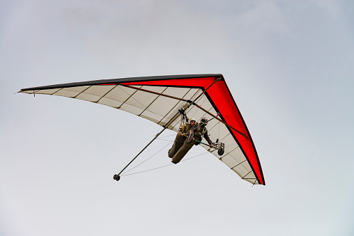 2020-05-24, Fasova, Ukraine. Learning to fly on a hang glider. Tandem hang glider with pilot and passenger.