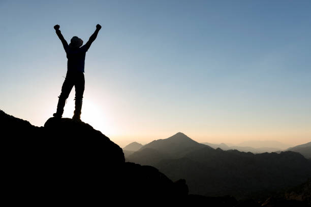 istock struggle and the triumph of the summit 1239436952