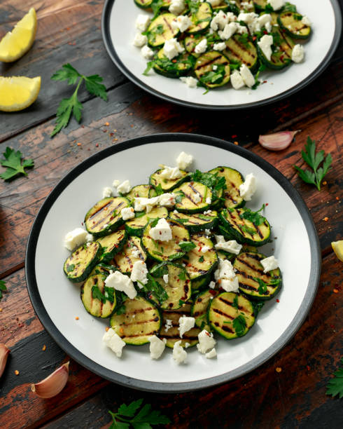 istock Warm salad with grilled zucchini, garlic and herbs 1239461532