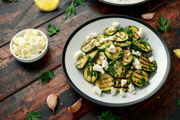 istock Warm salad with grilled zucchini, garlic and herbs 1239462914