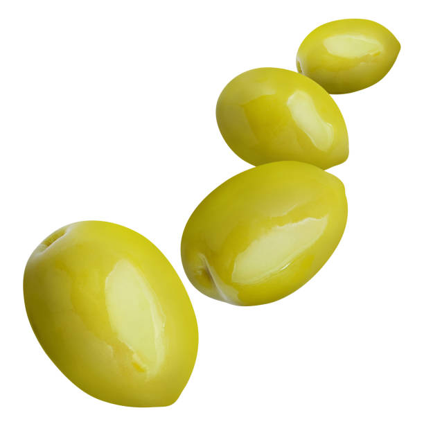 istock Flying delicious olives on white 1239463720