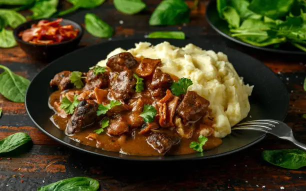 Fried Liver, bacon in onion gravy with mashed potato.