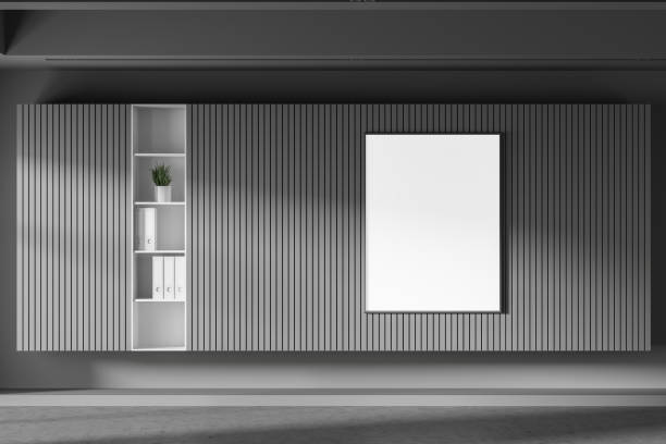 istock Gray living room with poster and bookcase 1239469400