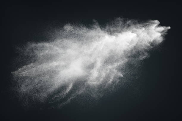 istock Abstract design of white powder cloud on dark background 1239470474