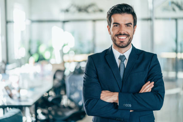 istock Confident and smiling businessman 1239479611