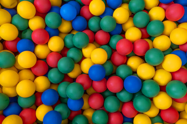 istock Many colour plastic balls from children's small town 1239491999