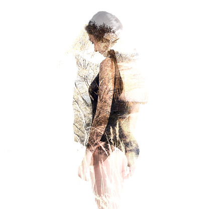 Double exposure of sad young woman with depression over lake landscape background. Introspective and mindfulness concept.