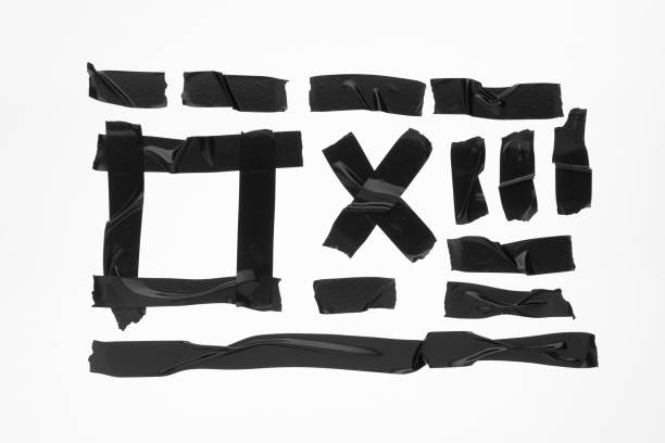 istock Black adhesive duct tape isolated on white background, collection 1239518000