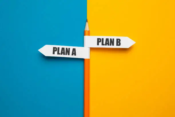 Photo of Pencil - direction indicator - choice of plan a or plan b. Business strategy, failure analysis and not give up