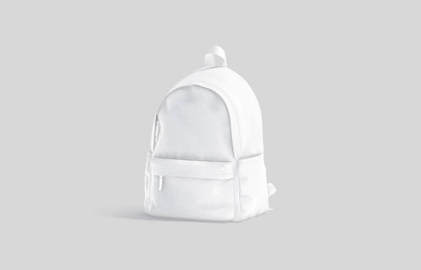Blank white closed backpack with zipper mockup, half-turned view Blank white closed backpack with zipper mockup, half-turned view, 3d rendering. Empty student carry back pack mock up, gray background. Clear fabric schoolbag or haversack mokcup template. shoulder bag stock pictures, royalty-free photos & images